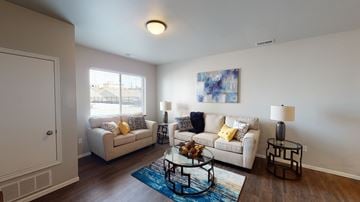 Bismarck apartment for rent - a living room with couches and a coffee table