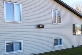 West Fargo triplex for rent - A house with the number 401 on the side.