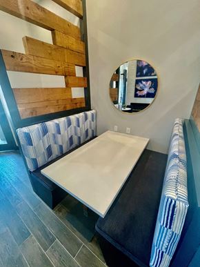 Lubbock apartment for rent - a dining room with a table and a mirror