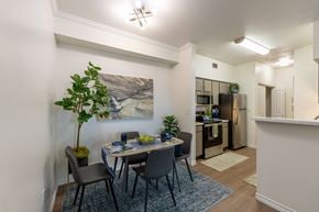 Lubbock apartment for rent - A dining room with a table set for four.