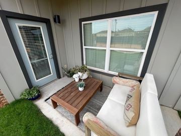 Lubbock apartment for rent - a living room with a couch and a coffee table