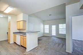 Lubbock apartment for rent - A kitchen with white cabinets and a countertop.