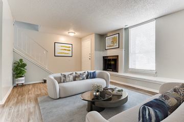Richardson apartment for rent - a living room with a couch and a table
