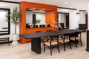 Baltimore apartment for rent - a large dining room with a black table and chairs at Vision on Lombard, Baltimore, MD 21201