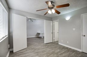 Phoenix apartment for rent - a bedroom with a ceiling fan and a closet at Valencia Park, Phoenix, AZ