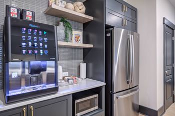 Resident community room w/ kitchen, pool table, computer & coffee station