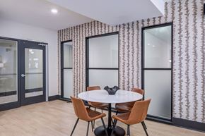 Raleigh apartment for rent - A room with a round table and chairs.