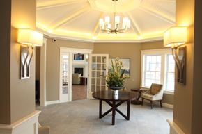 South Windsor apartment for rent - a living room with a table and a chandelier
