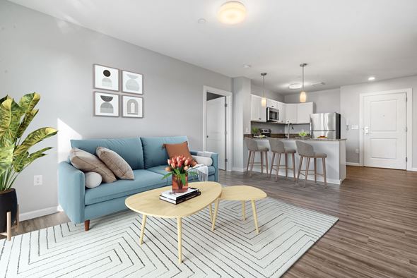 Nashua apartment for rent - a living room with a couch and a table