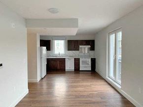 Cambridge apartment for rent - Modern plank flooring, large bright windows, open floor plan.