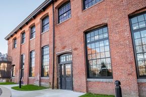 Mansfield apartment for rent - Black doors and trim, oversized windows, beautiful brickwork.