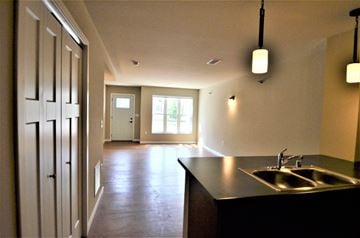 River Falls townhouse for rent - A kitchen with a sink and a window.