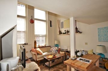 La Crosse apartment for rent - a living room with a couch and a table