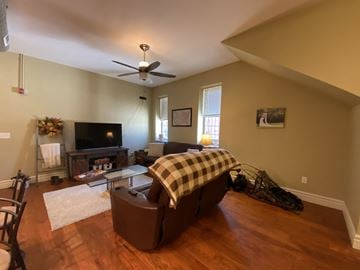 La Crosse apartment for rent - a living room with a couch and a tv