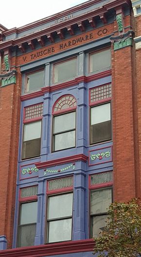 La Crosse apartment for rent - a tall building with a blue facade and windows