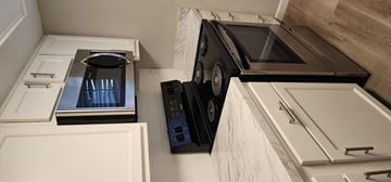 Cincinnati apartment for rent - a kitchen with a microwave and a toaster oven