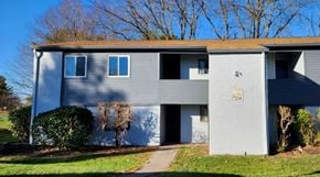 Cincinnati apartment for rent - a blue and white house with a sidewalk in front of it
