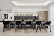 Miramar apartment for rent - A modern kitchen with a long table and chairs.