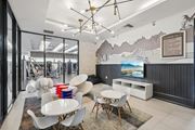 Miramar apartment for rent - A modern dining room with a large table and chairs.