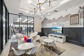 Miramar apartment for rent - A modern dining room with a large table and chairs.