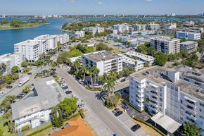 Bay Harbor Islands apartment for rent - an aerial view of a city with buildings and a body of water