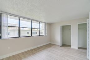 Bay Harbor Islands apartment for rent - A room with a large window and wooden flooring.