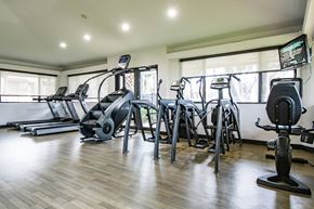 Miami apartment for rent - A gym with treadmills, exercise bikes, and other equipment.