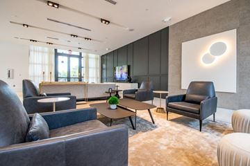 Miramar apartment for rent - a living room with couches and chairs and a television