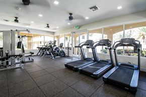 Hialeah apartment for rent - the gym is equipped with cardio equipment at the apartments