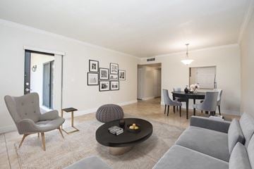 Kendall apartment for rent - a living room with a couch and a table