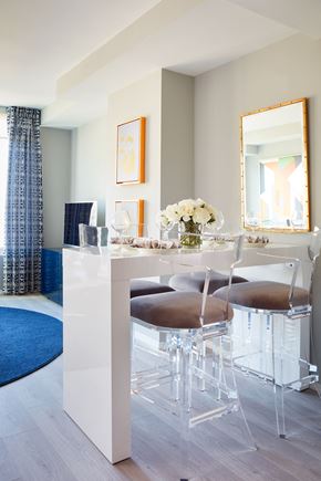 Washington apartment for rent - a dining room with a white table and chairs