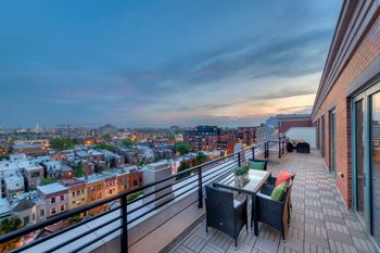 Outdoor dining belvedere overlooking the lively u street scene