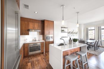 Sleek stainless steel appliances and thermador™ refrigerator