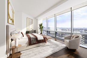 Arlington apartment for rent - a bedroom with a bed and a chair in a 555 waverly unit  at 220 Twentieth Street, Arlington
