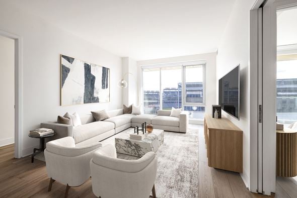 Washington apartment for rent - a living room with white furniture and a large window