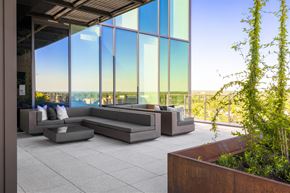 Bethesda apartment for rent - a lounge area with couches in front of a glass facade