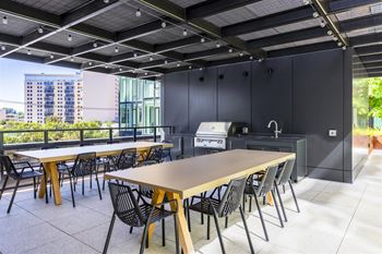 Rooftop terrace with grills and plenty of seating