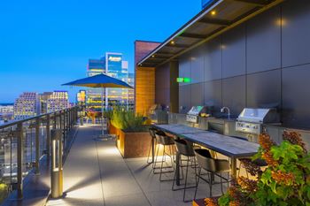 Rooftop terrace with grills and plenty of seating