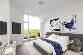 Bethesda apartment for rent - a bedroom with a large bed and a window