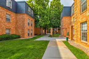 Fort Collins townhouse for rent - a walkway between two buildings on a sunny day