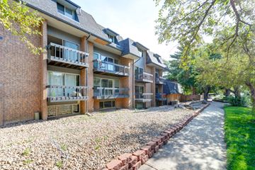 Boulder apartment for rent - an empty sidewalk in front of an apartment building