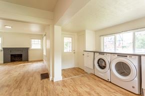Boulder apartment for rent - A laundry room with a washer and dryer in it.