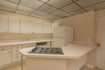Denver apartment for rent - a kitchen with a stove and a refrigerator