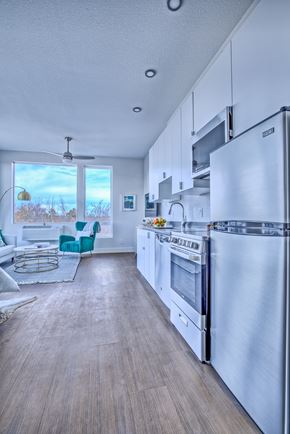 Denver apartment for rent - Kitchen with Wooden Floor at Sloan's Place Apartments, Denver, 80214