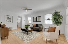 Denver apartment for rent - a living room with a couch and a table