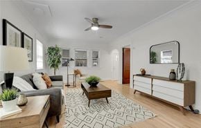 Denver apartment for rent - a living room with a couch and a table