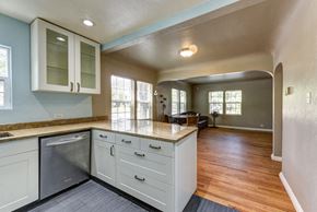 Denver apartment for rent - A kitchen with a dishwasher and a refrigerator.