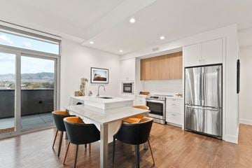 Boulder apartment for rent - A modern kitchen with a dining table and chairs.