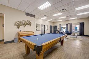 Fort Collins townhouse for rent - a pool table and foosball table in a resident clubhouse