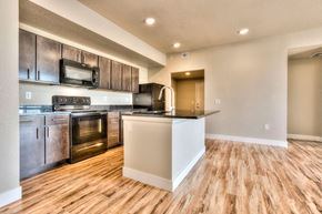 Fort Collins apartment for rent - a kitchen with stainless steel appliances and a counter top